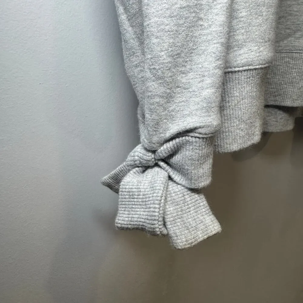 Two by Vince‎ Camuto cold shoulder top with ties on sleeves Size Small